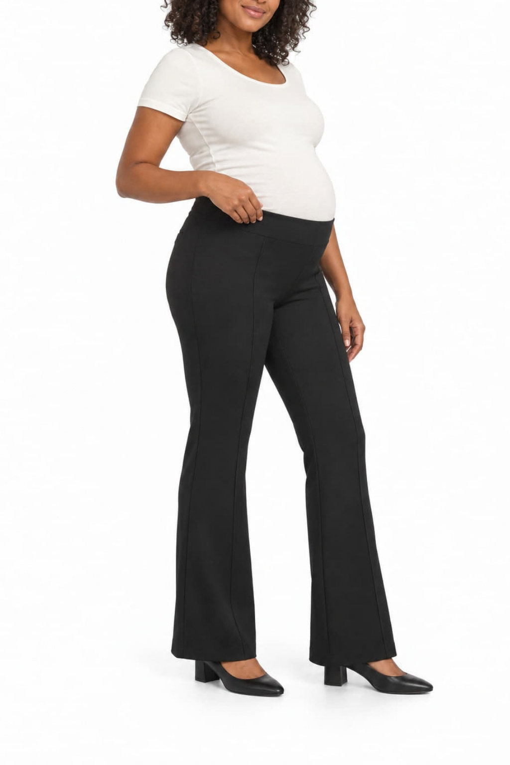 Angled front view of black maternity flare pants on a model, showing how the legs fall toward the hem.