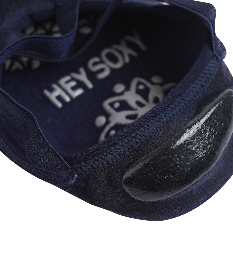 Close-up of a navy blue Hey Soxy no-show sock with non-slip grip on the heel.
